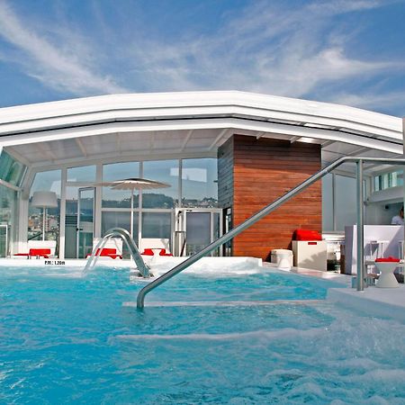 Gran Hotel Nagari Boutique&Spa Vigo Bagian luar foto The rooftop pool at the Mandarin Oriental Barcelona